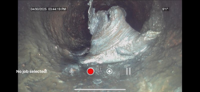Close-up of drainline obstruction from plumbing camera service