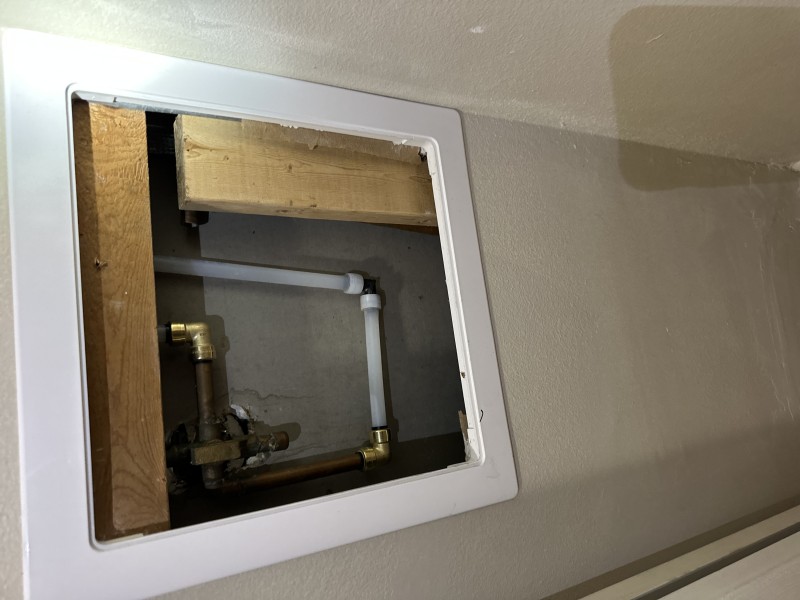 Washer box repiping with brass and PEX