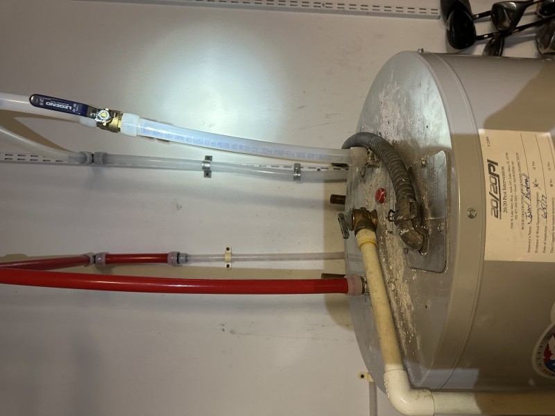 Water heater repiping with PEX and shutoff valve