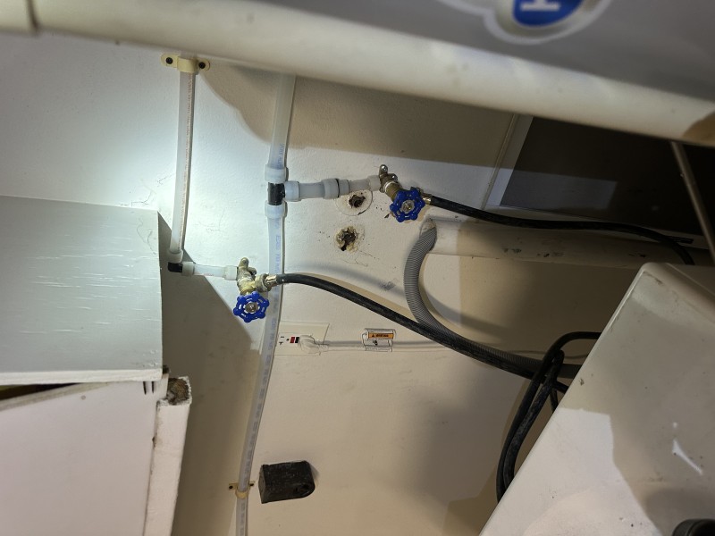 Laundry room plumbing reroute with PEX lines