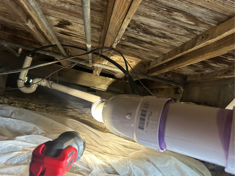PVC piping installed in crawl space