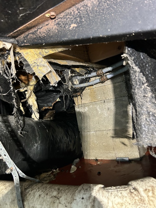 Damaged poly pipe section exposed