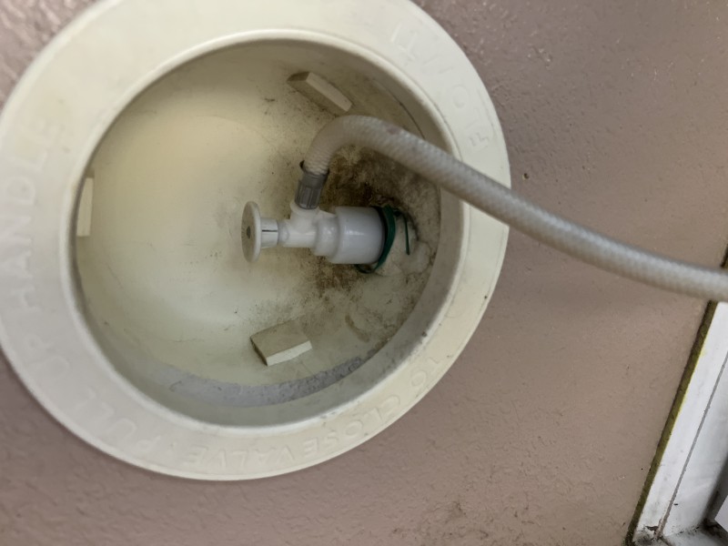 Water puddle below kitchen cabinets