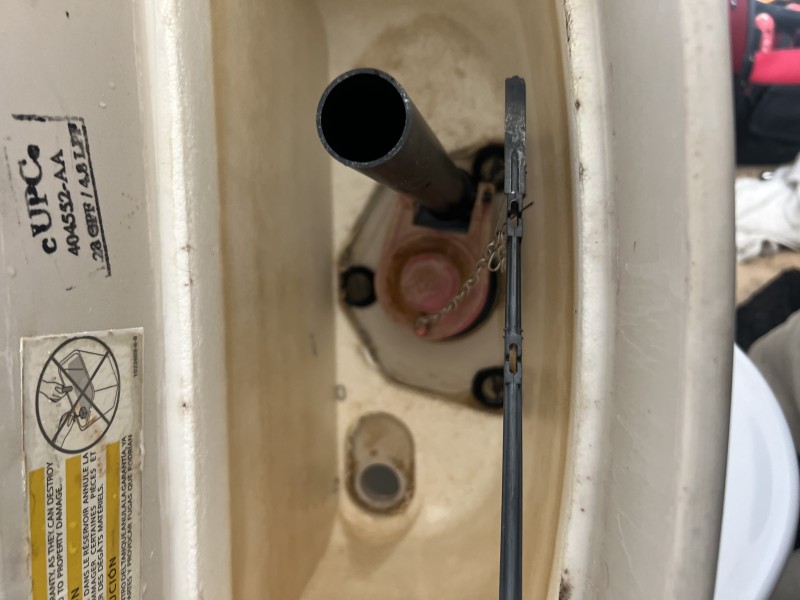 Toilet tank after repair - new fill valve installed