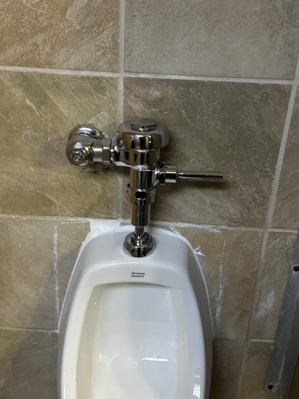 New Sloan flush valve mounted