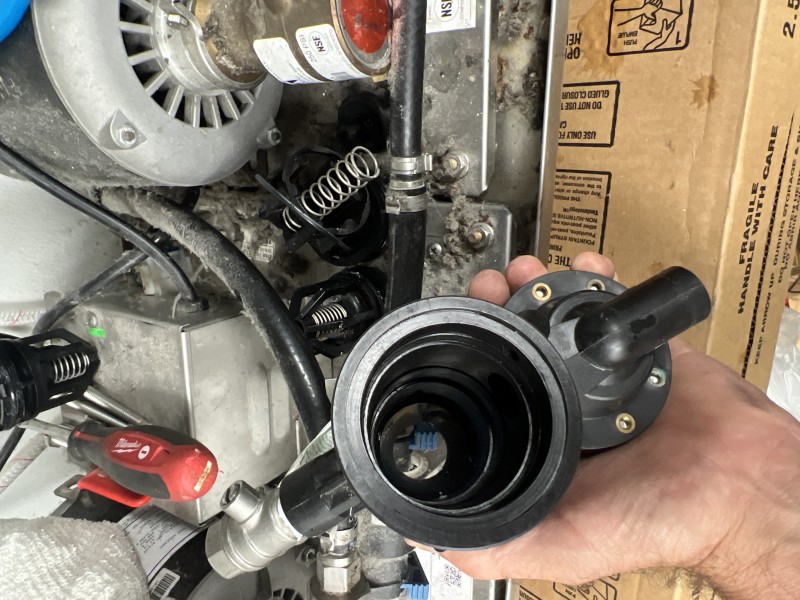 Close-up of backflow preventer connected to water line