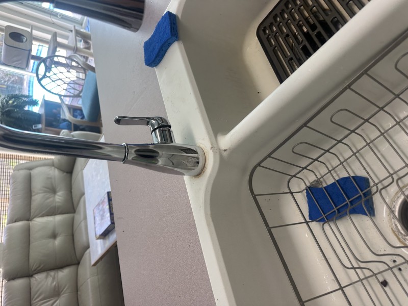 Side view of the newly installed faucet
