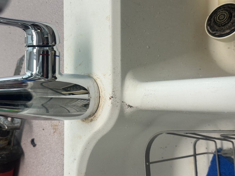 Plumbing tools used for kitchen fixture replacement