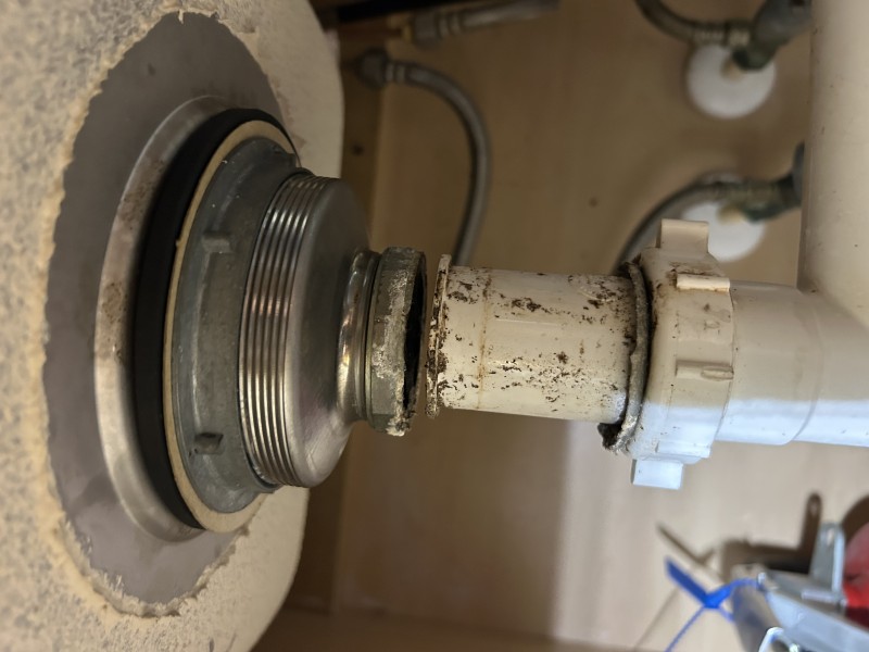 Securing drainpipe with wrench