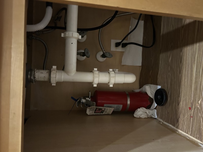 Completed under-sink plumbing repair