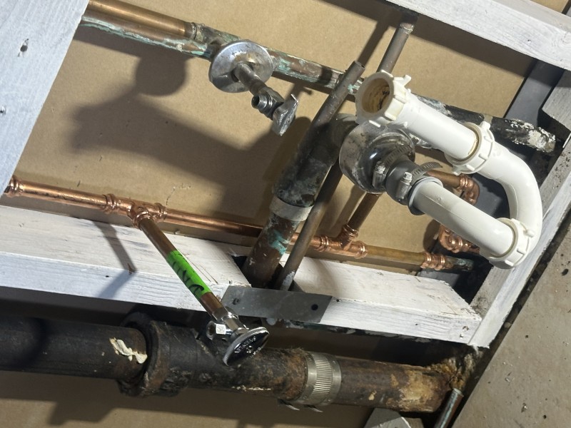 Installing and soldering a new copper manifold with flux for leak-free joints