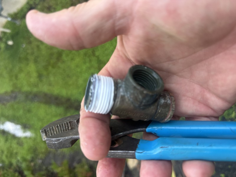 Isolating water supply and removing corroded pressure relief valve