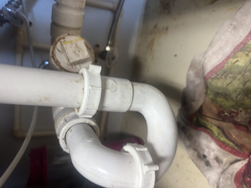 Pressure and dye testing the new trap installation