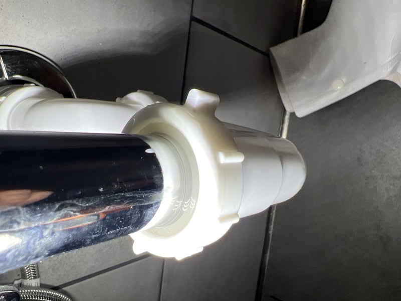 Close-up of corroded compression fitting and ferrule on cold-water supply