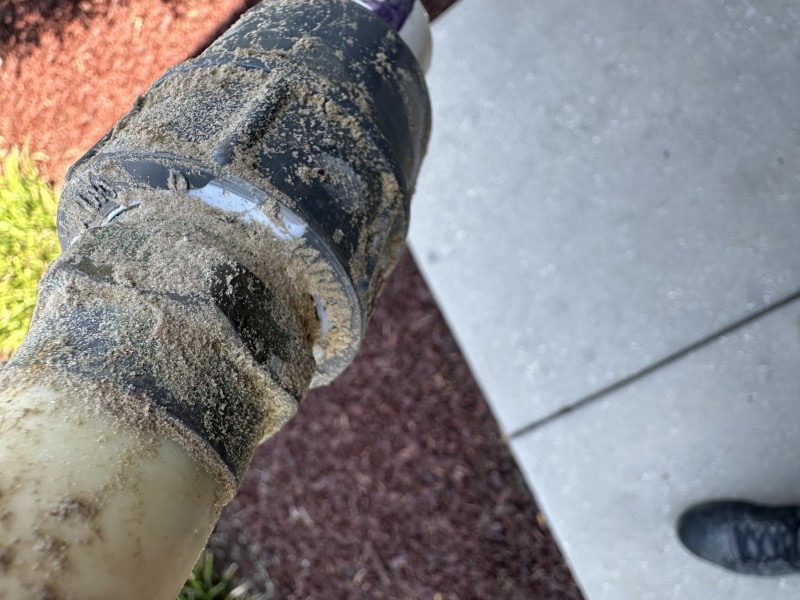Removed damaged pipe section from the leaking water service.