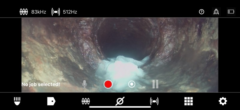 Under-slab PVC to cast-iron transition with standing water and back-pitch