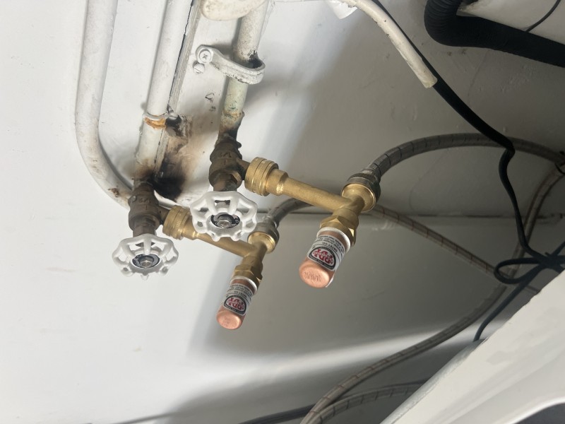 Installed hammer arrestors on washing machine supply lines to stop banging pipes