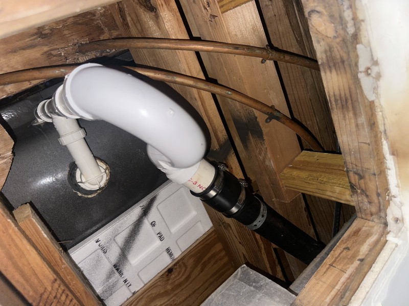 Final flow test showing fast draining bathtub with leak-free PVC trap