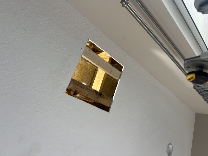 Applying mold-resistant caulk and waterproofing the shower base area