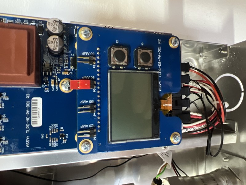 Plumber checking water pressure and gas line sizing with gauge and manometer