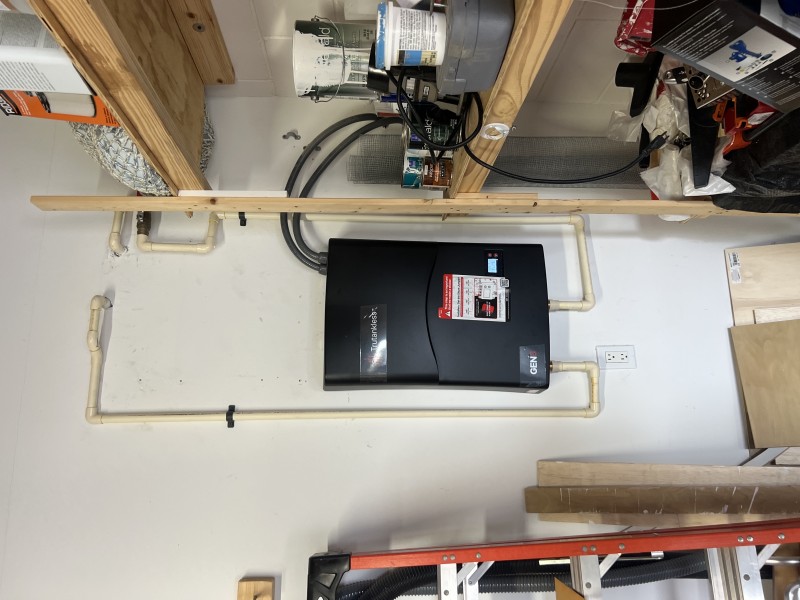 Venting and condensate management for the tankless water heater