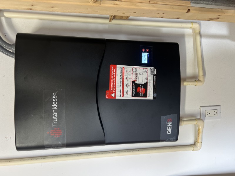 Final commissioning and temperature verification on the tankless unit