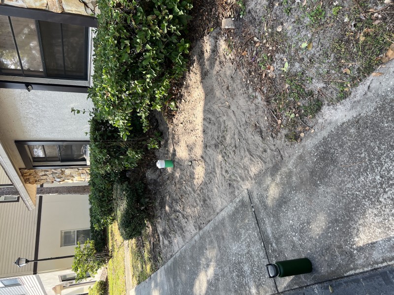 Backfilled and compacted sewer trench after repair is completed