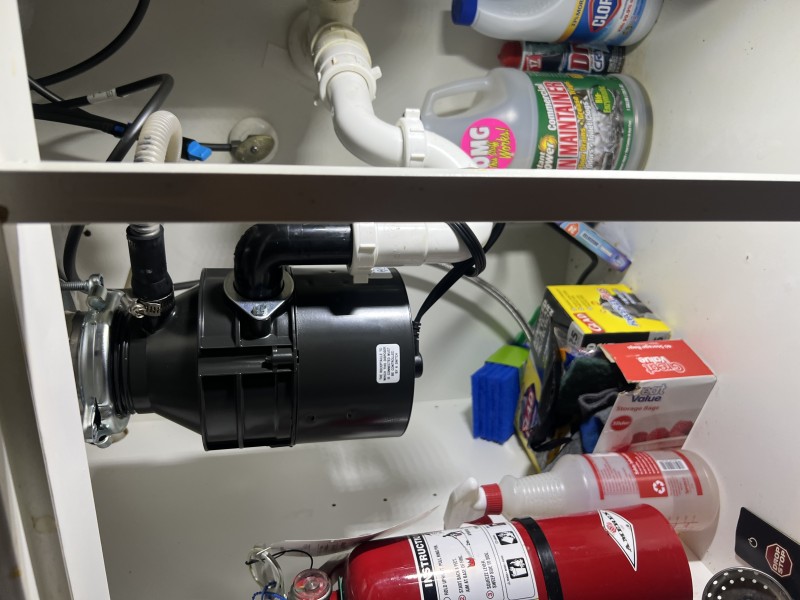 Brand new InSinkErator garbage disposal installed under sink