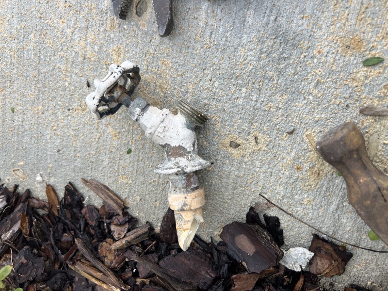 Broken hose bib removed from exterior wall, Orlando, FL, December 2025