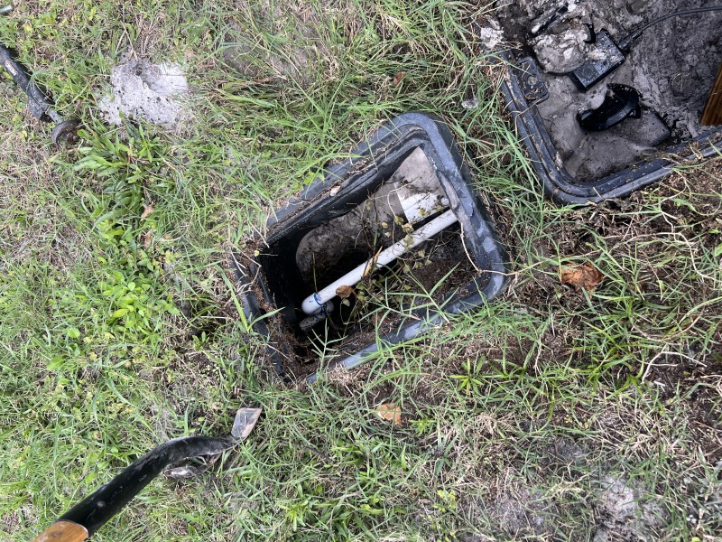 Marking the dig path and work zone for an underground water service line repair, Deltona, FL, mid-December 2025