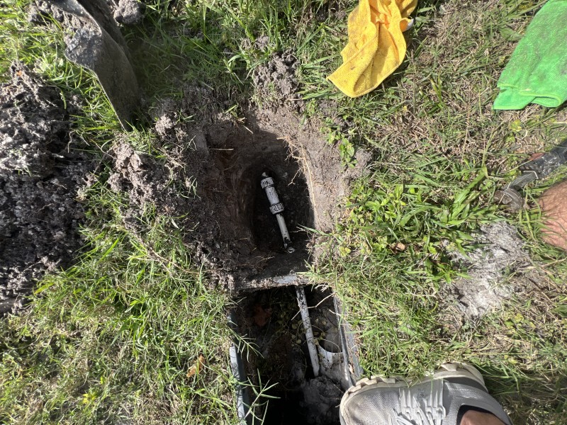 Exposed broken section of the metered pipe facing the home prior to cutting and removal, Deltona, FL, mid-December 2025