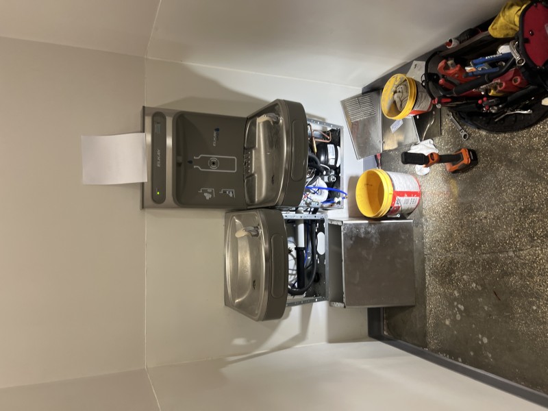 Accessing internal water lines and components of drinking fountain, Orlando FL, January 6 2026