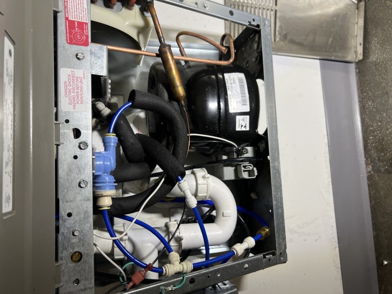 Identifying debris blockage inside evaporator of drinking fountain, Orlando FL, January 6 2026