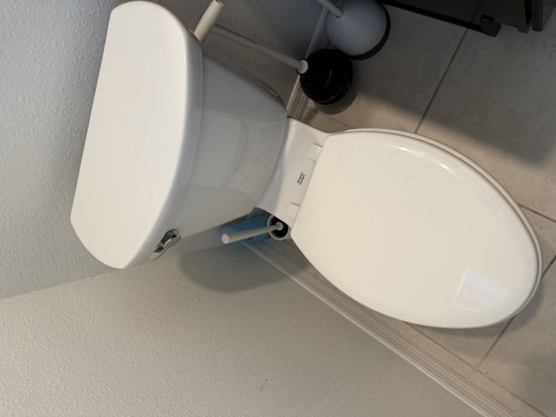 New toilet installed and secured after clearing the drain line and confirming pipe condition with a sewer camera inspection, Tampa, FL, February 23, 2026