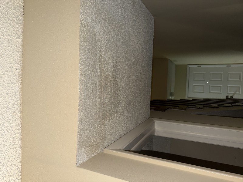 Ceiling with visible water damage and access cutout below second floor plumbing, Land O' Lakes, Florida, March 2026