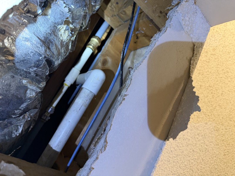 New CPVC pipe installed and routed through ceiling cavity with clean connections, Land O' Lakes, Florida, March 2026