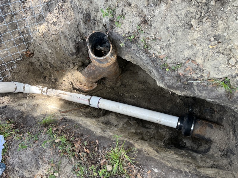 Adjusted sewer pipe alignment and slope inside trench for proper drainage, Zephyrhills FL, March 2026