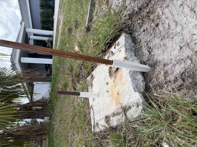New copper risers installed with protective sleeves before concrete repour, Sarasota FL, April 2026