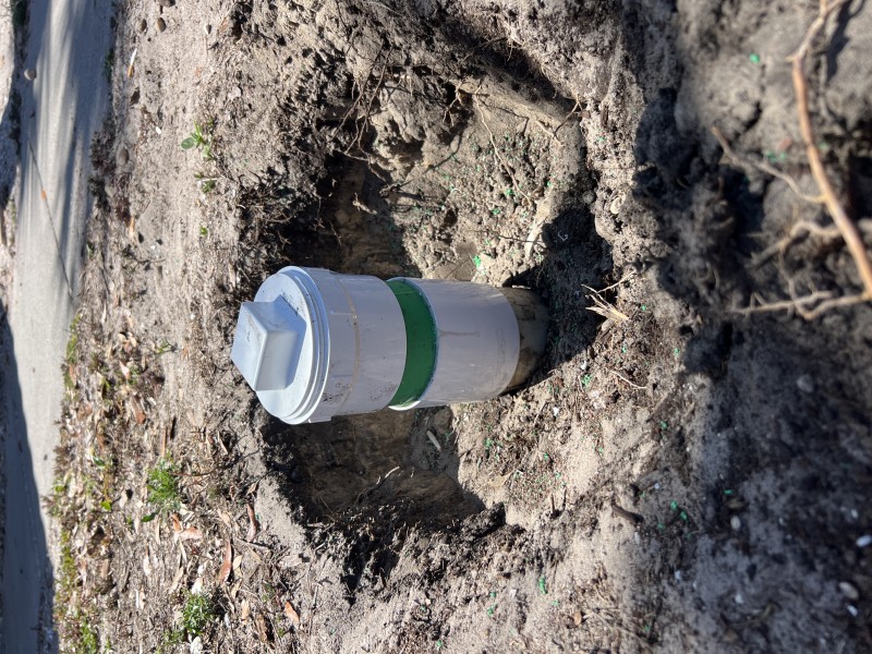New 4 inch SDR pipe and cleanout adapter installed in trench during sewer repair, Spring Hill Florida April 2026