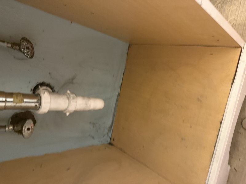 Completed bathroom sink drain rebuild with new white PVC drain pipes and extension tube fully installed and tested, Tampa FL, April 2026
