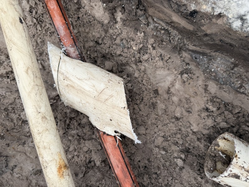 Fiber optic communication line discovered passing through sewer pipe in New Port Richey, Florida, May 2026